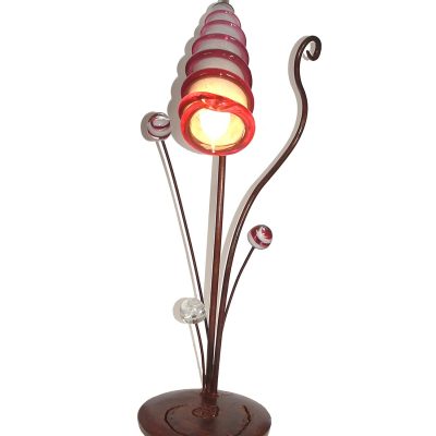 Lámparas sobre mesa. Vidrio soplado y hierro